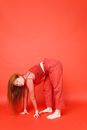Woman in Red Blazer and White Shirt