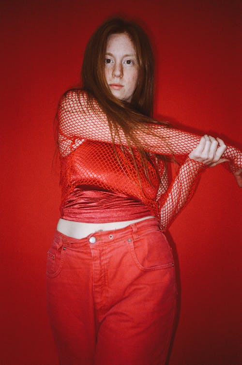 A Woman in Red Long Sleeve Shirt