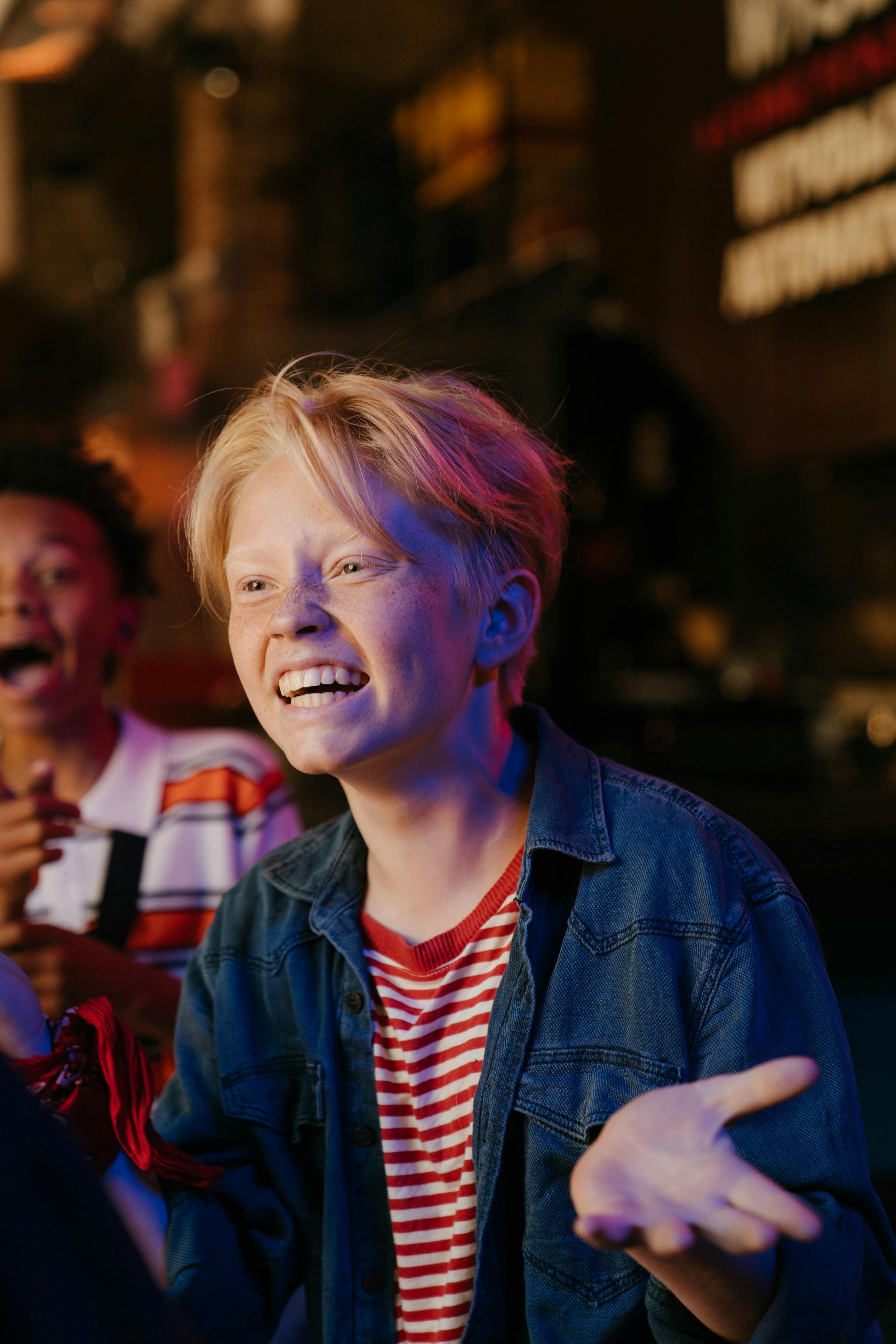 girl in blue jacket smiling