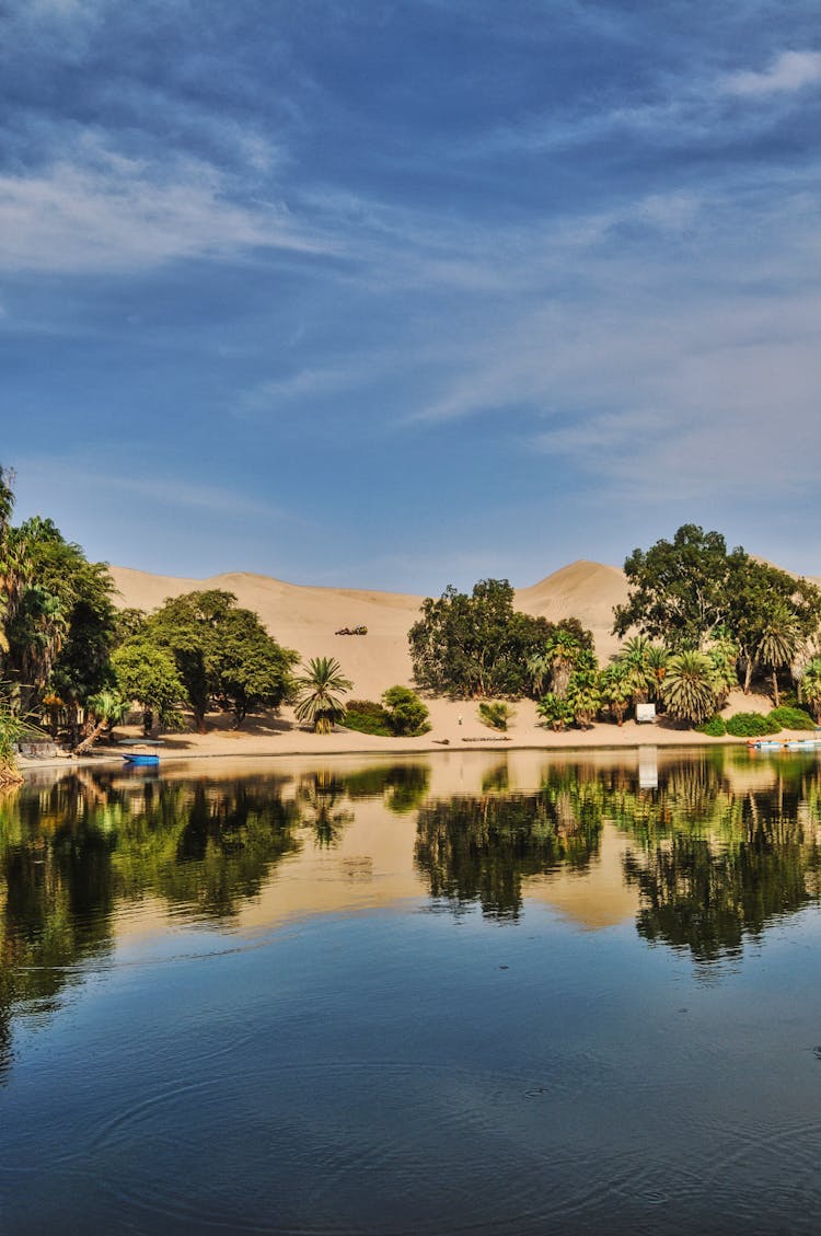 The Huacachina Lake, A Peruvian Oasis In The Middle Of The Desert