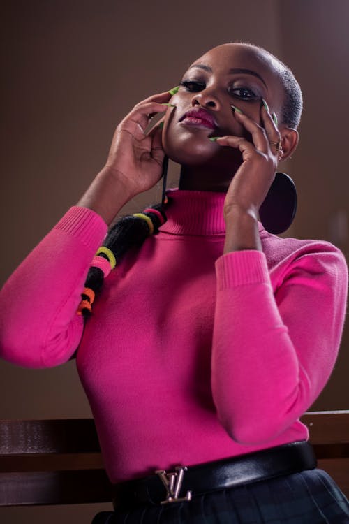 A Woman in Pink Long Sleeve Shirt