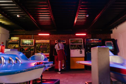 A teenager with pigtails plays classic arcade games in a vintage setting.