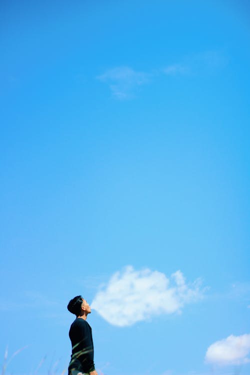 A Man in Black Long Sleeve Shirt