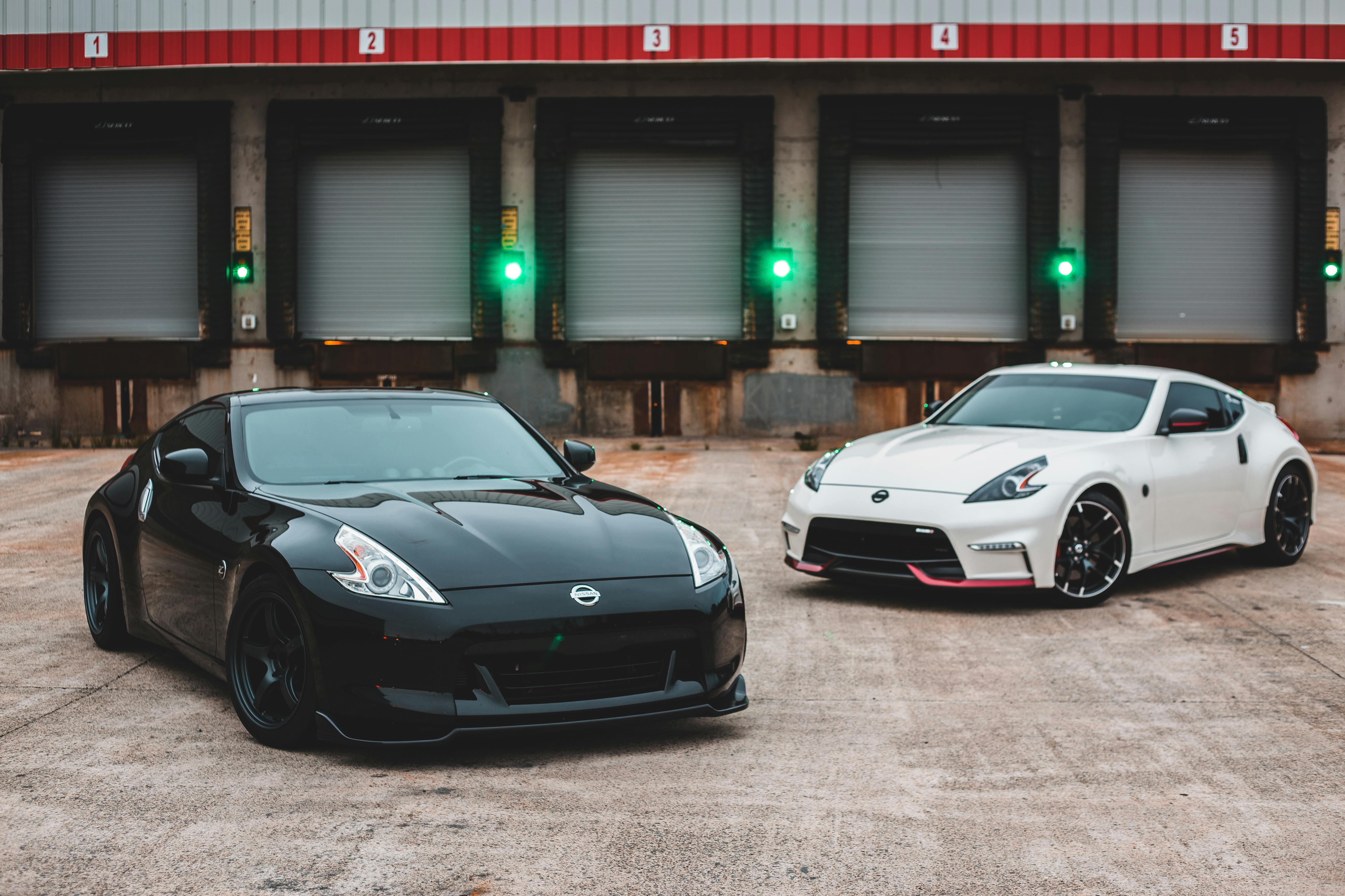 trendy racing cars parked on loading zone