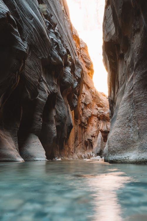 Free A Slot Canyon with Water in Utah Stock Photo
