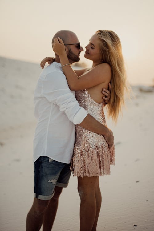 Man and Woman Kissing Each Other