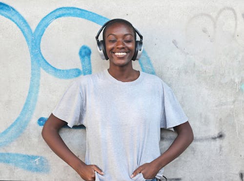 Portrait of Happy Woman Wearing Headphones