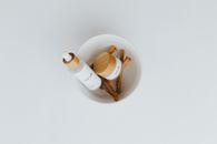 White and Brown Medicine Bottle on White Ceramic Mug