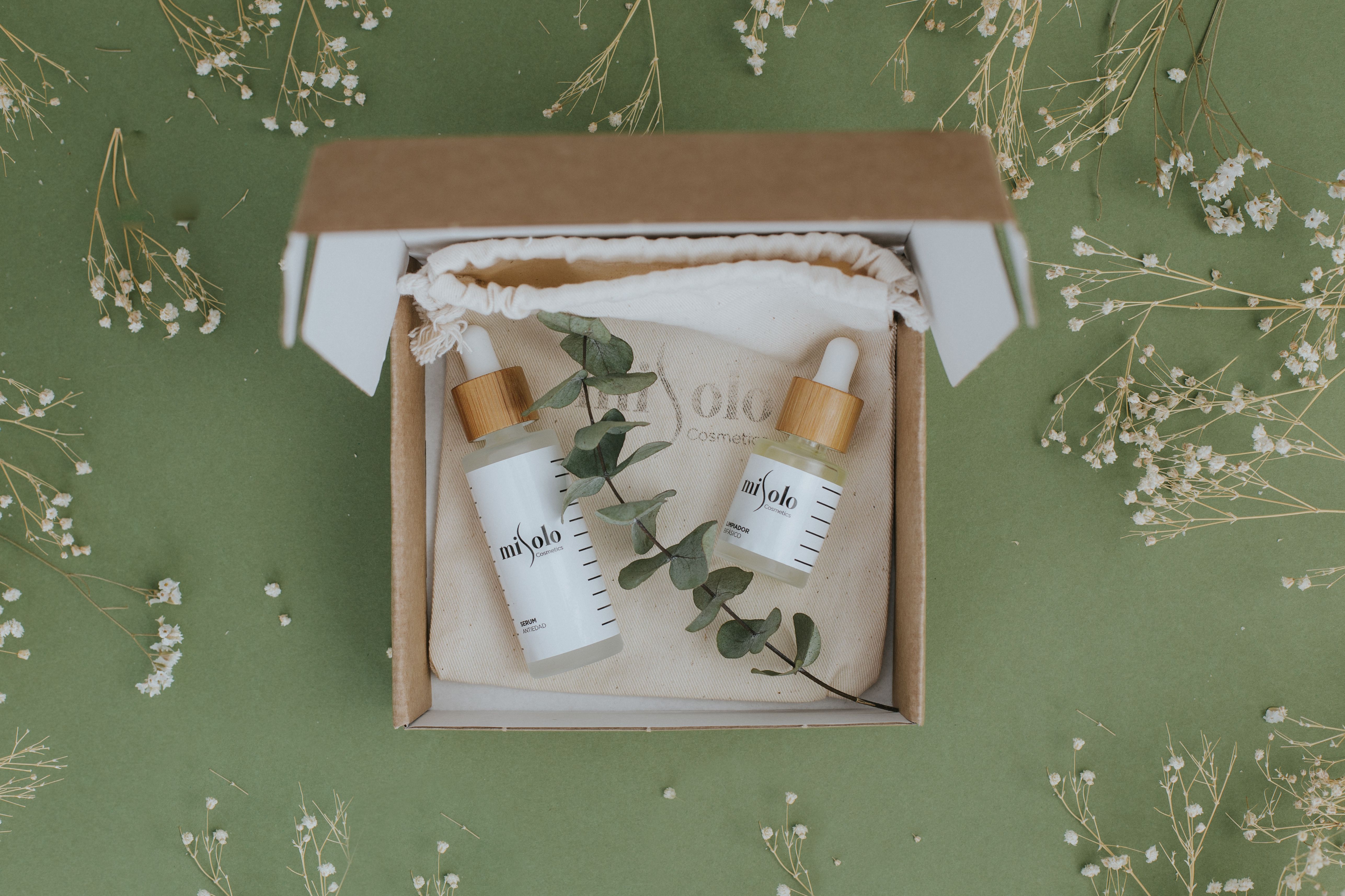A cardboard box containing skincare and personal care products