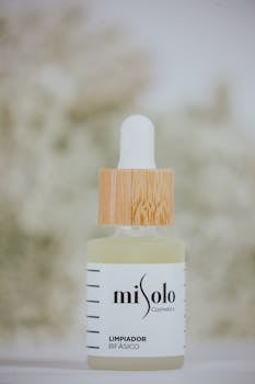 Close-up of Misolo cosmetic serum with wooden dropper, perfect for skincare imagery.