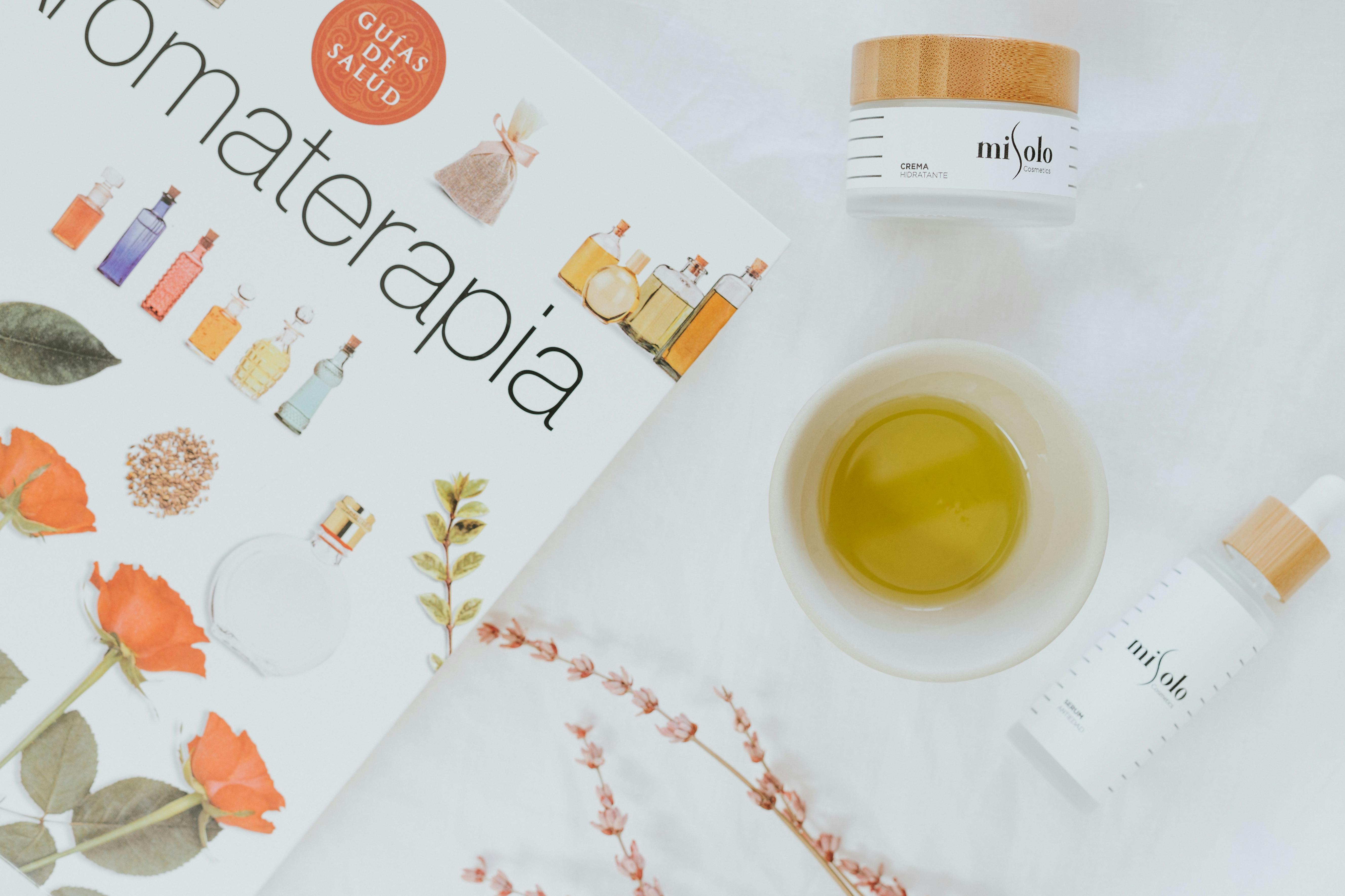 Free Product Brochure and Bottle on a White Surface Stock Photo