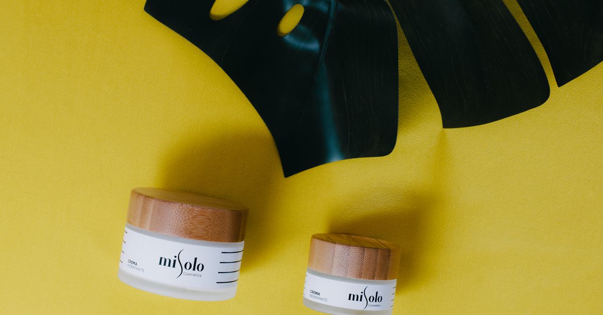 Close Up Shot Of Skincare Products On A Yellow Surface Free Stock Photo close-up-shot-of-skincare-products-on-a-yellow-surface-free-stock-photo