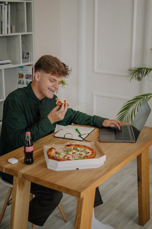 Man in Green Long Sleeves Shirt Smiling