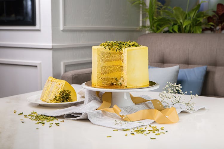 Yellow Cake On White Ceramic Plate