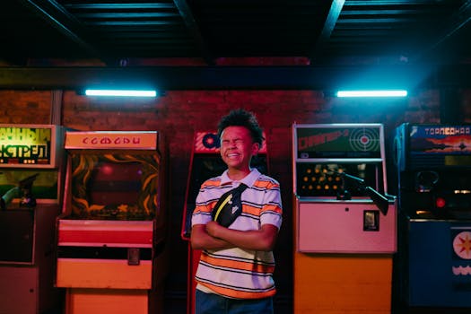 Smiling teenager enjoying a fun moment in a vibrant neon-lit arcade with classic game machines.