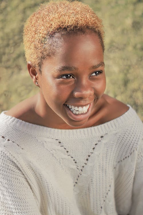 Woman Wearing Knitted Sweater Smiling