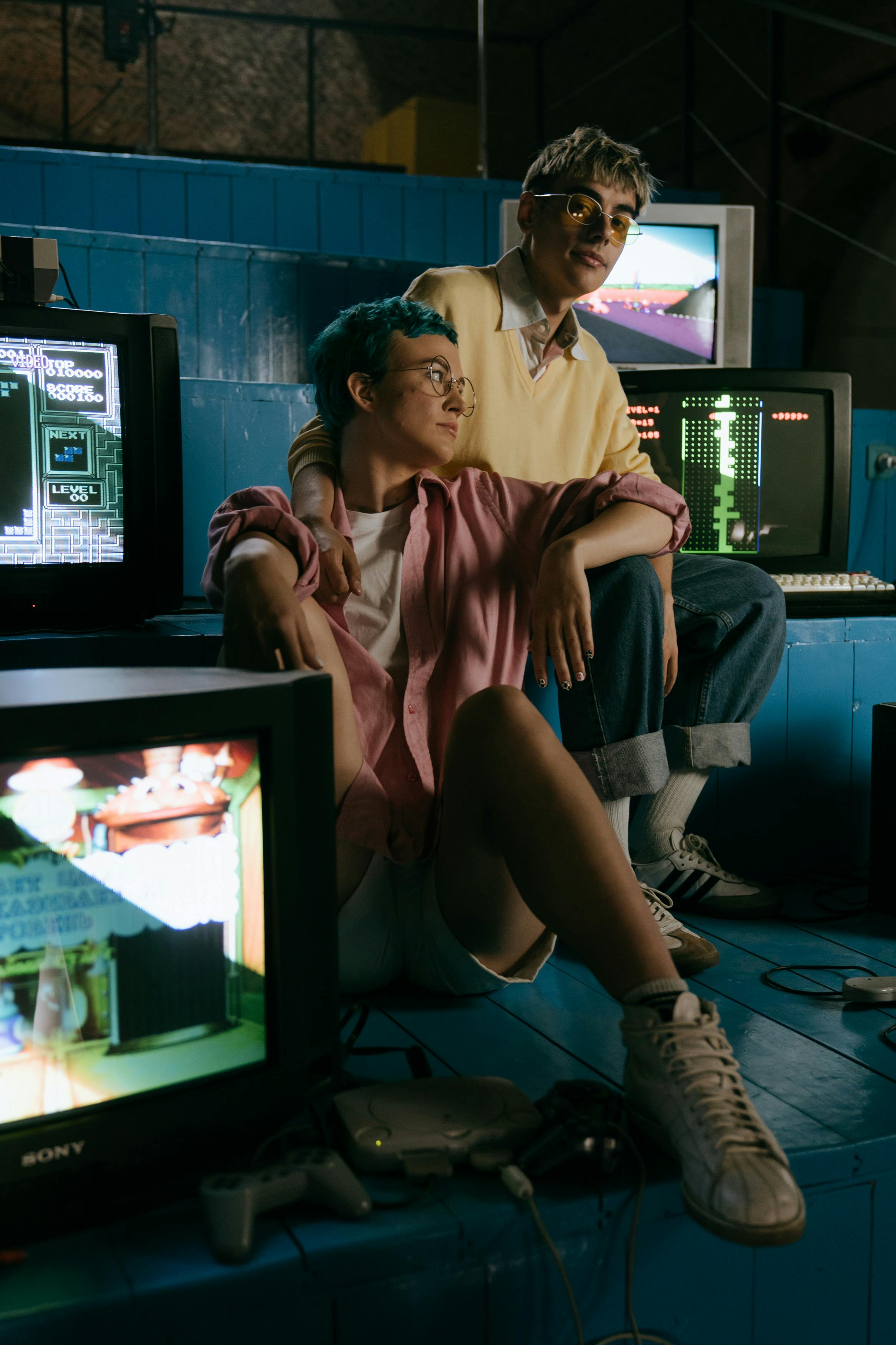 woman in yellow button up shirt sitting on black chair