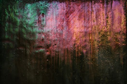 Colorful abstract art piece with vibrant jewel tones and textured surface.