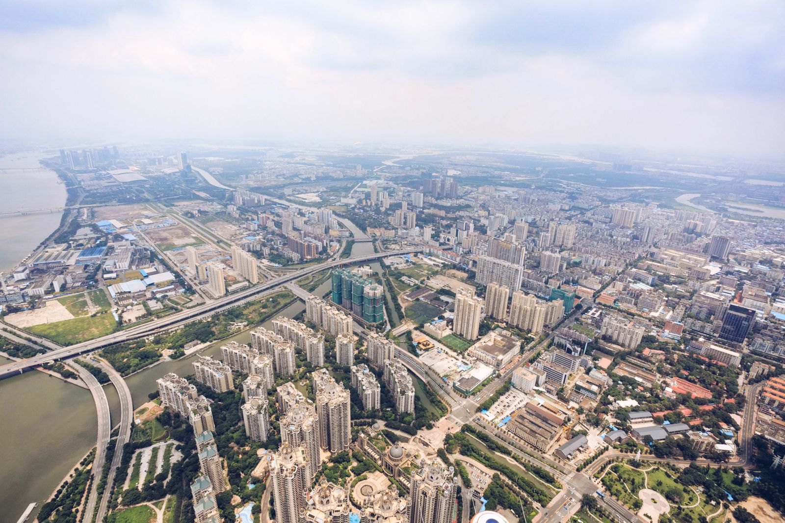 High-angle view over a city and river.