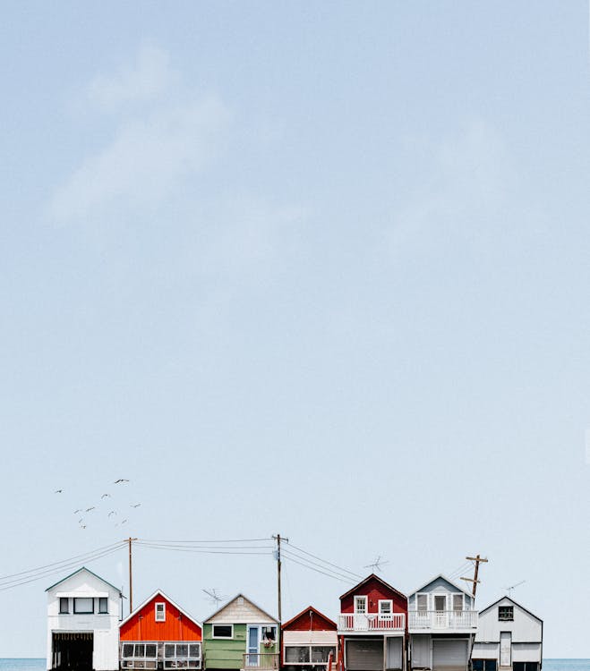 Wooden Houses Under the Blue Sky