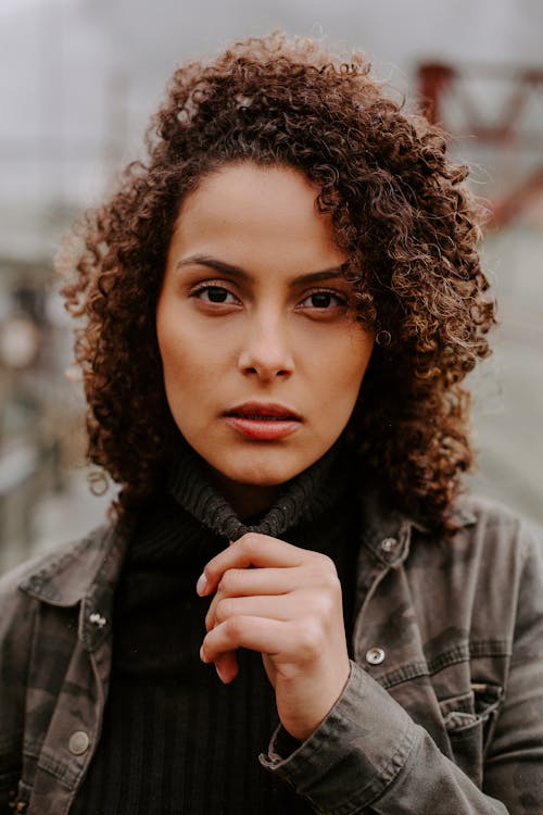 Close-Up Shot of a Curly-Haired Woman