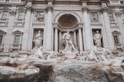 Old fountain decorated with sculptures