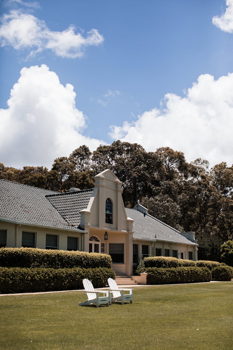 Exterior Of Modern House Near Green Lawn