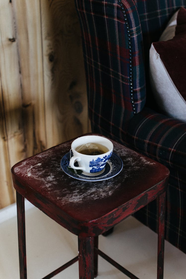 Ceramic Cup Of Tea On Stool