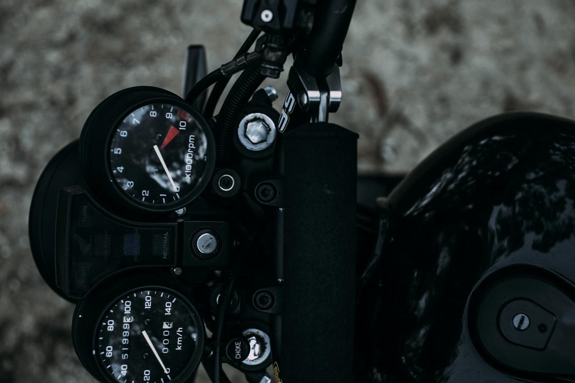 Speedometer and tank of motorcycle
