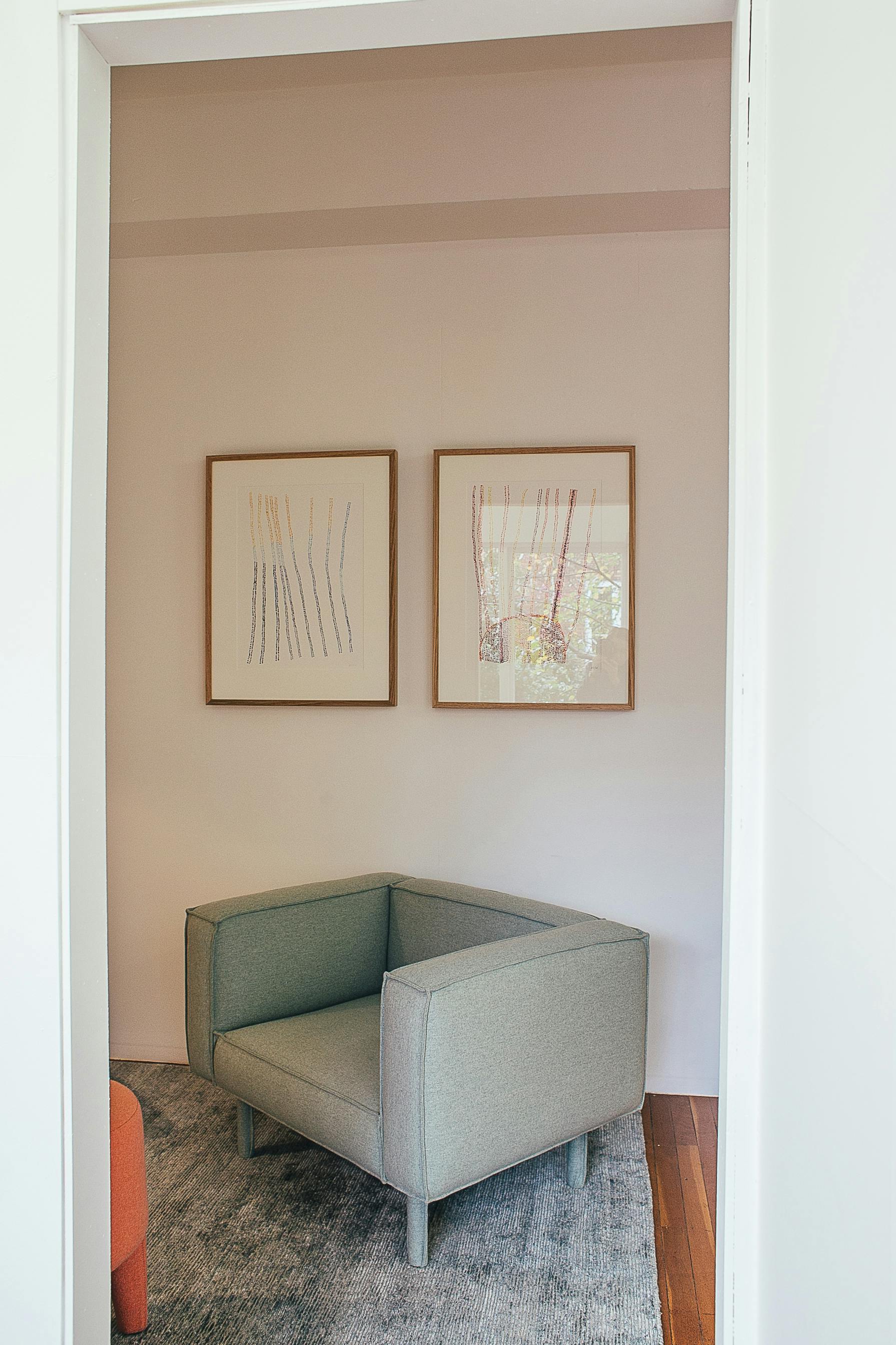 chair placed in living room with white wall