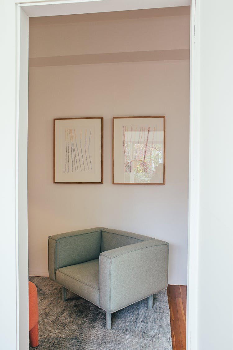 Chair Placed In Living Room With White Wall