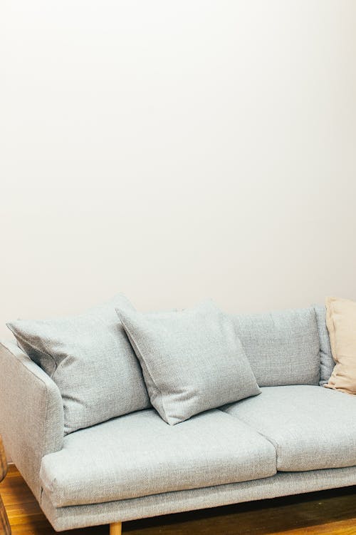 Interior of sofa with pillows in room