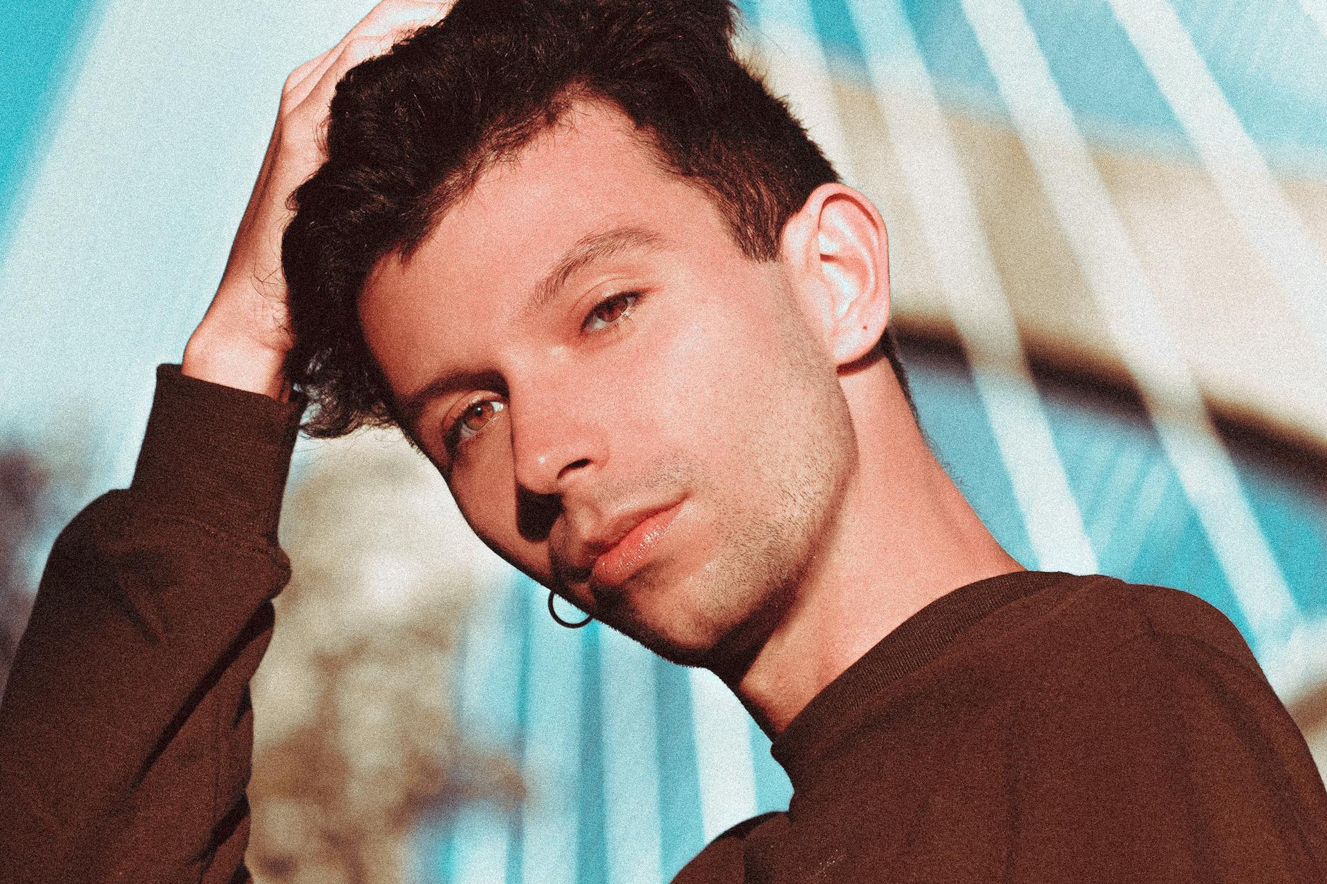 Portrait of Young Man with Ear Piercing