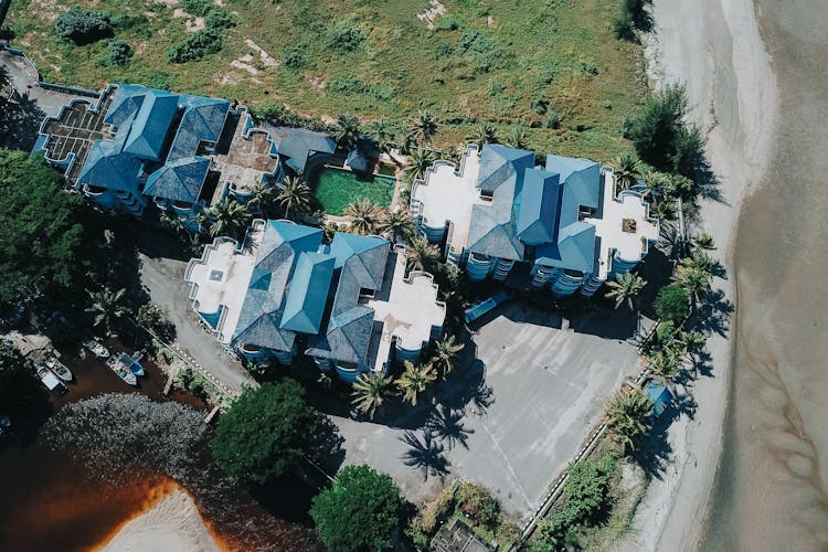 Aerial View Of Resort Blue Buildings With Swimming Pool