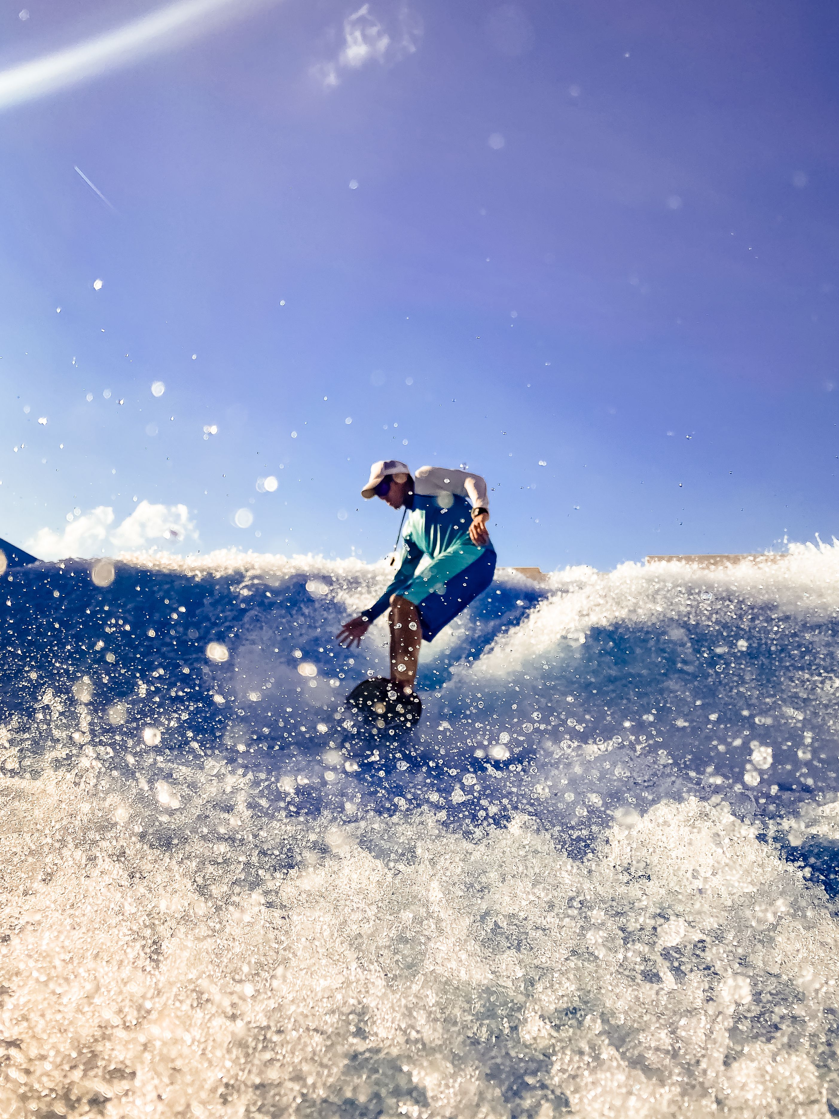 Grayscale Photo of a Person Riding a Wave · Free Stock Photo