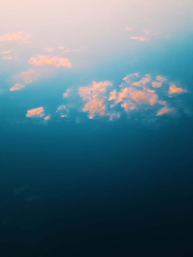 White Clouds On Deep Blue Sky