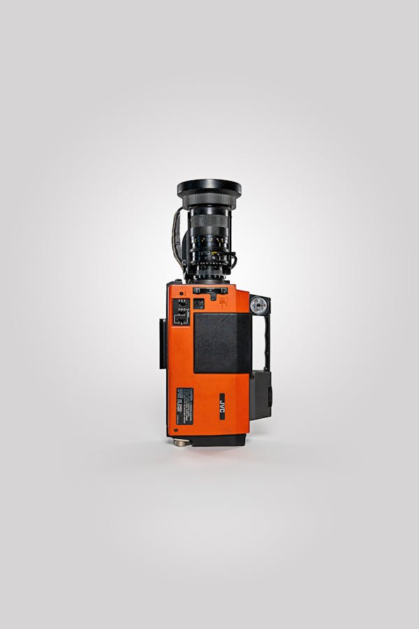 Brown and Black Camera on White Surface