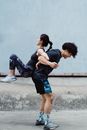 Pair of Athletes Working Out Together