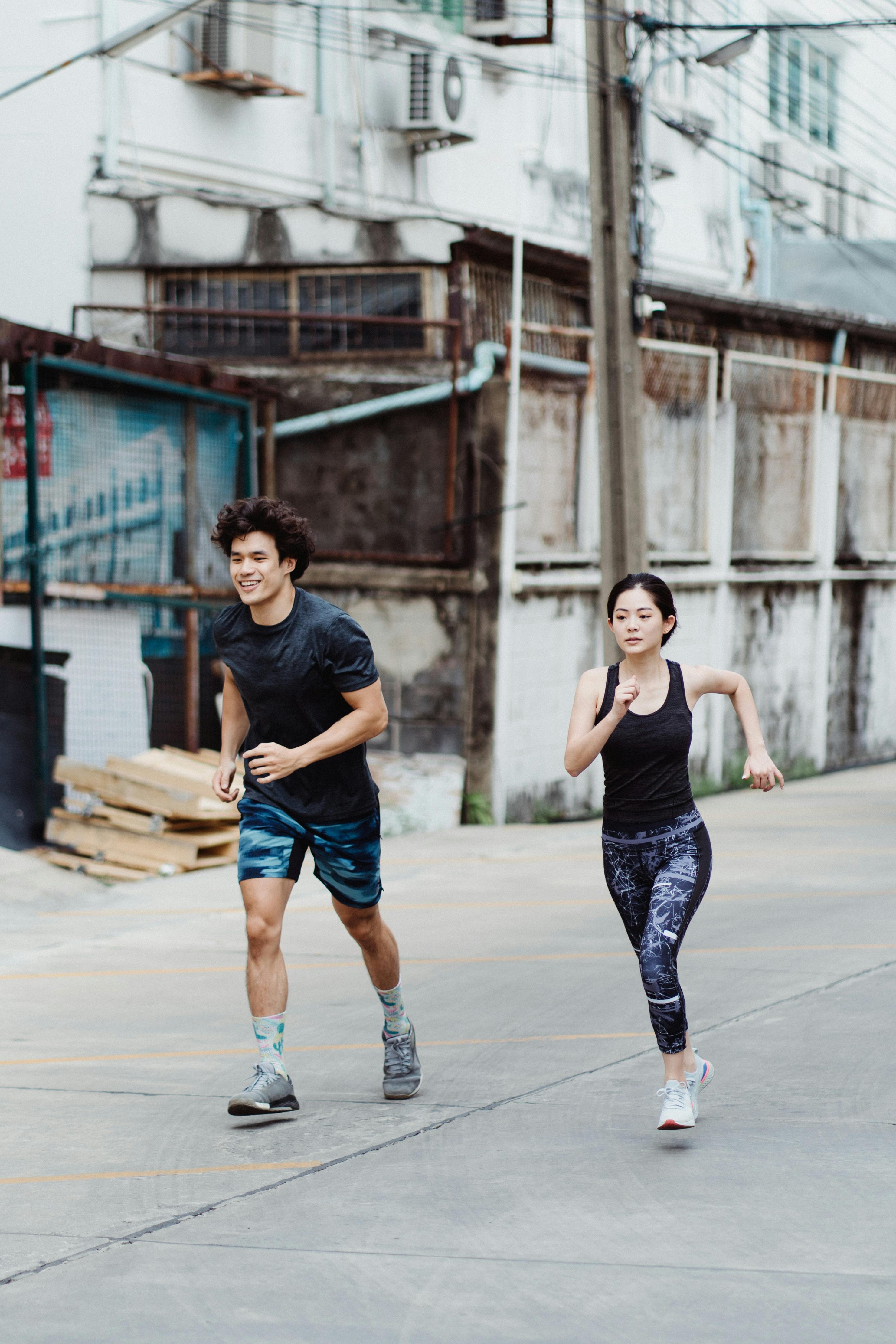 a man and a woman doing cardio