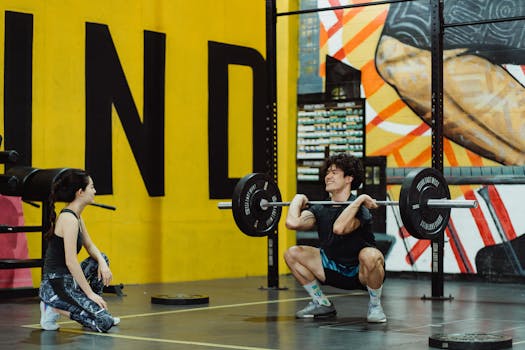 Man weightlifting in a colorful urban gym, showcasing strength and focus.