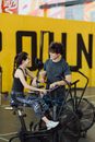 A Couple Setting Up an Elliptical Trainer