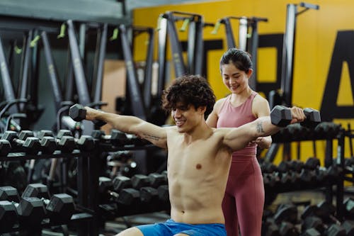 Man and Woman Exercise Together
