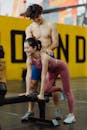 Woman in Purple Leggings Doing Exercise