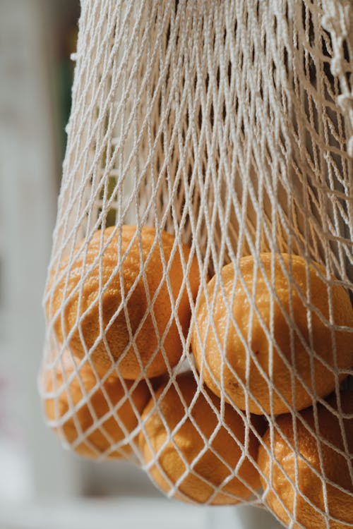 Free Orange Fruits on Brown Woven Basket Stock Photo