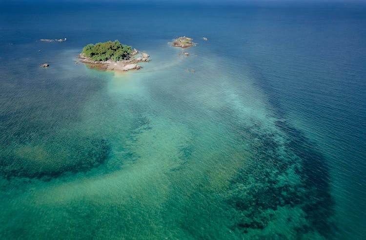 Small Tropical Island In Blue Ocean