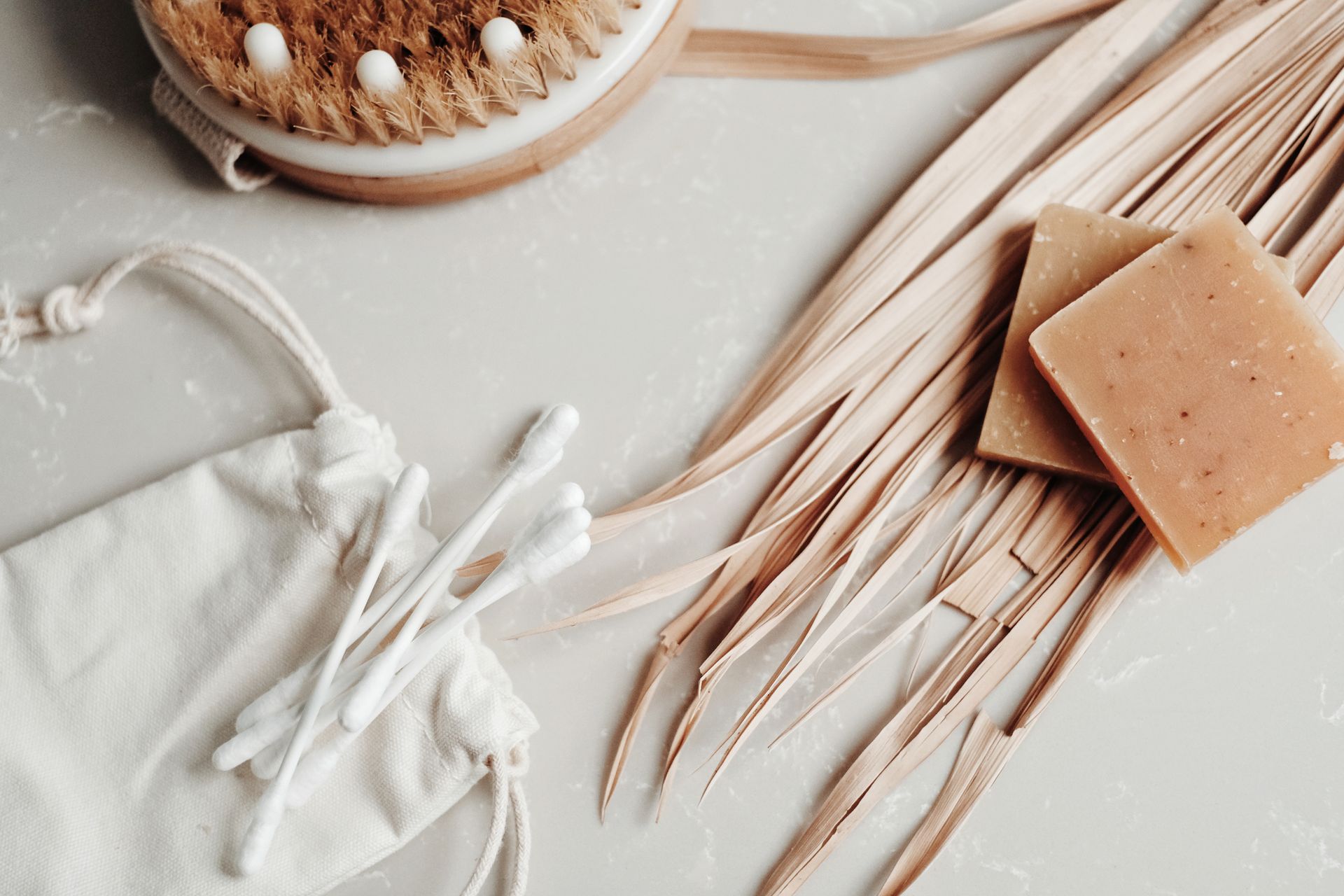 Ear Buds and Bar Soap on Table