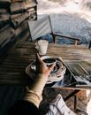 Unrecognizable woman drinking hot tea