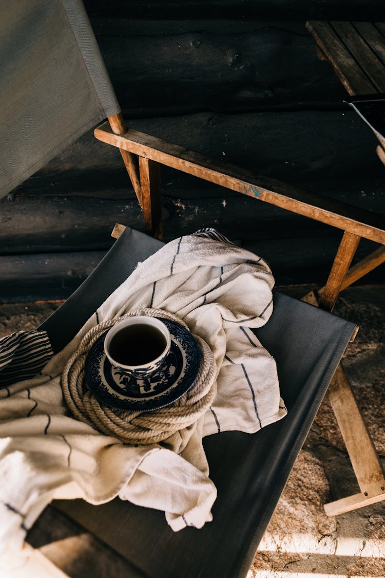 Cup With Hot Drink On Chair