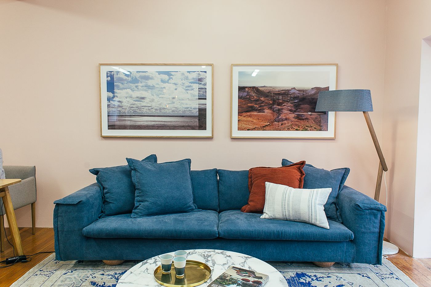 Soft evening lamps glow in a cozy living room, suggesting low-glare nighttime lighting