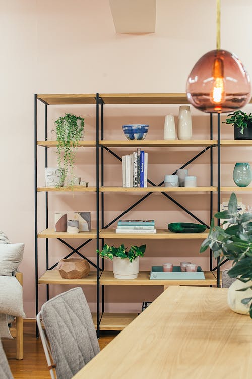 Shelves with various decorations in room